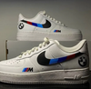 Custom white Air Force 1 sneakers with BMW M Power design