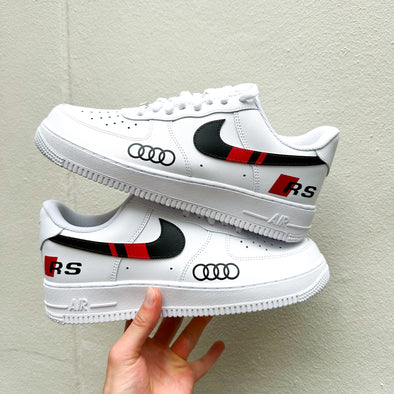 Hand-painted custom sneakers inspired by Audi RS with red stripe and logo details on white AF1 base – unisex streetwear
